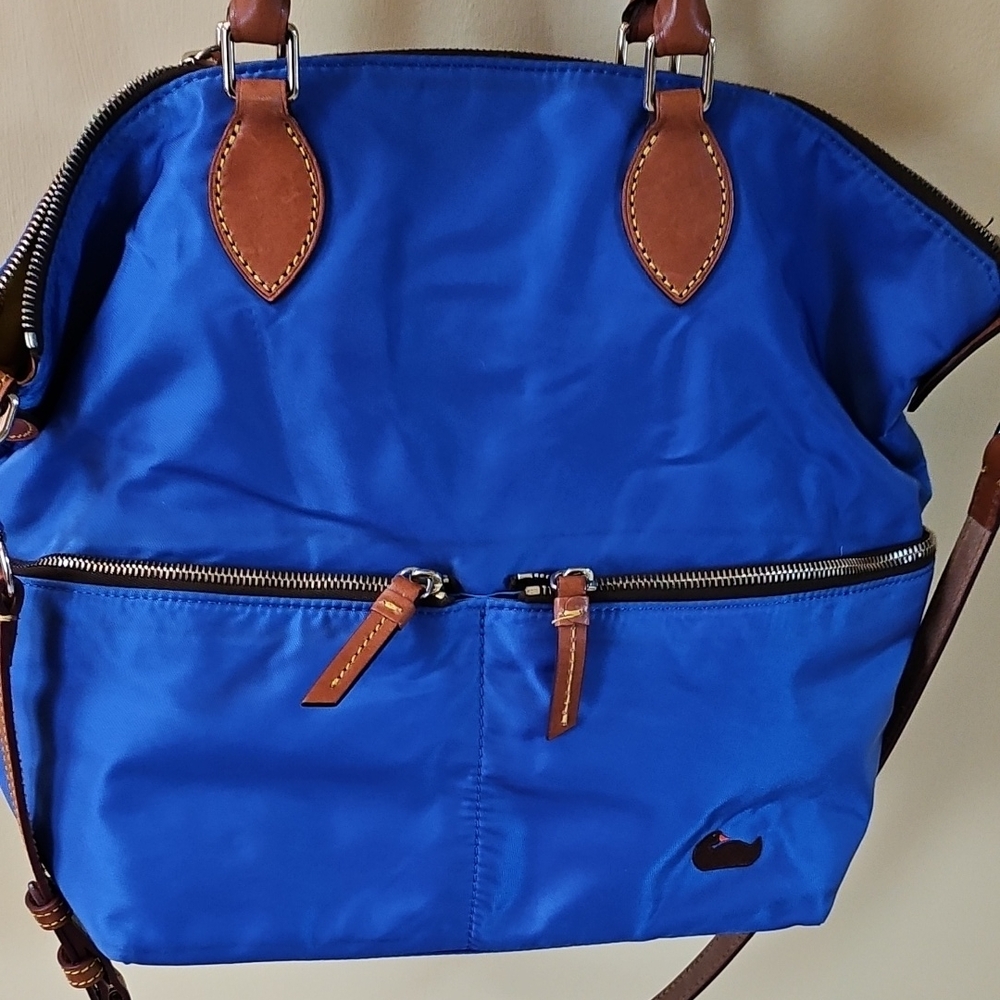 Dooney And Bourke Thick Cobalt Blue Nylon Tote Bag with Brown Leather Trim.